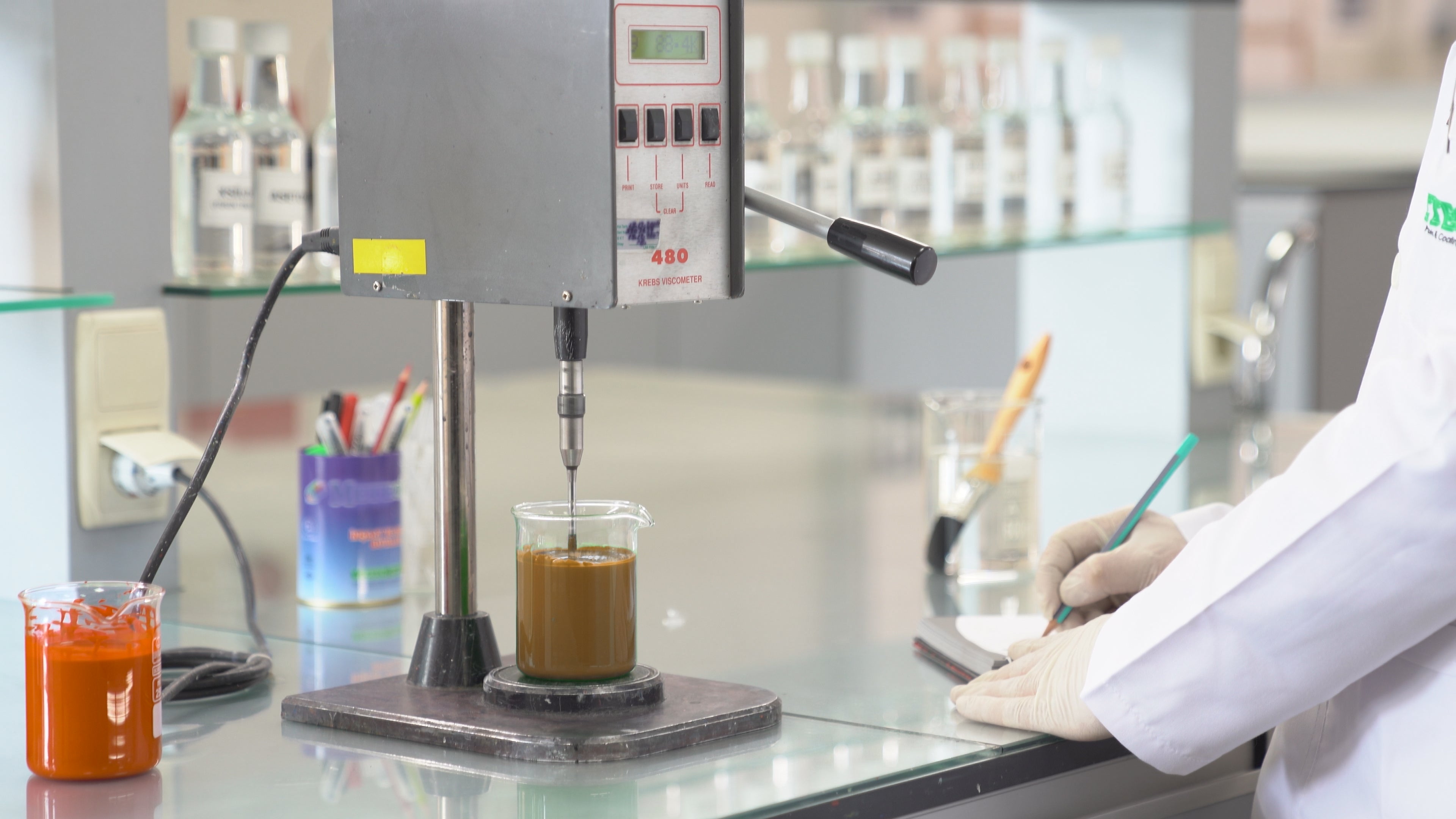 Wood coatings research laboratory investigating water-based formulations