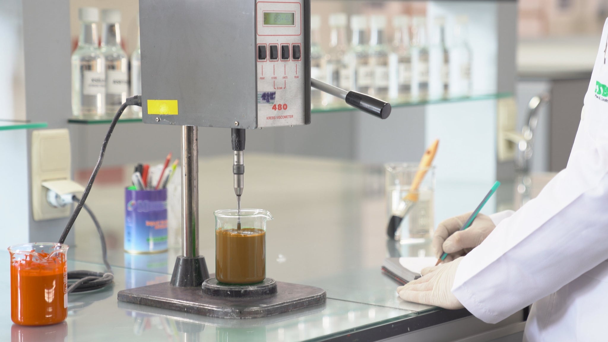 Wood coatings research laboratory investigating water-based formulations