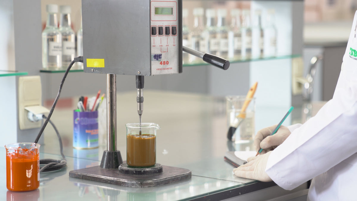 Wood coatings research laboratory investigating water-based formulations